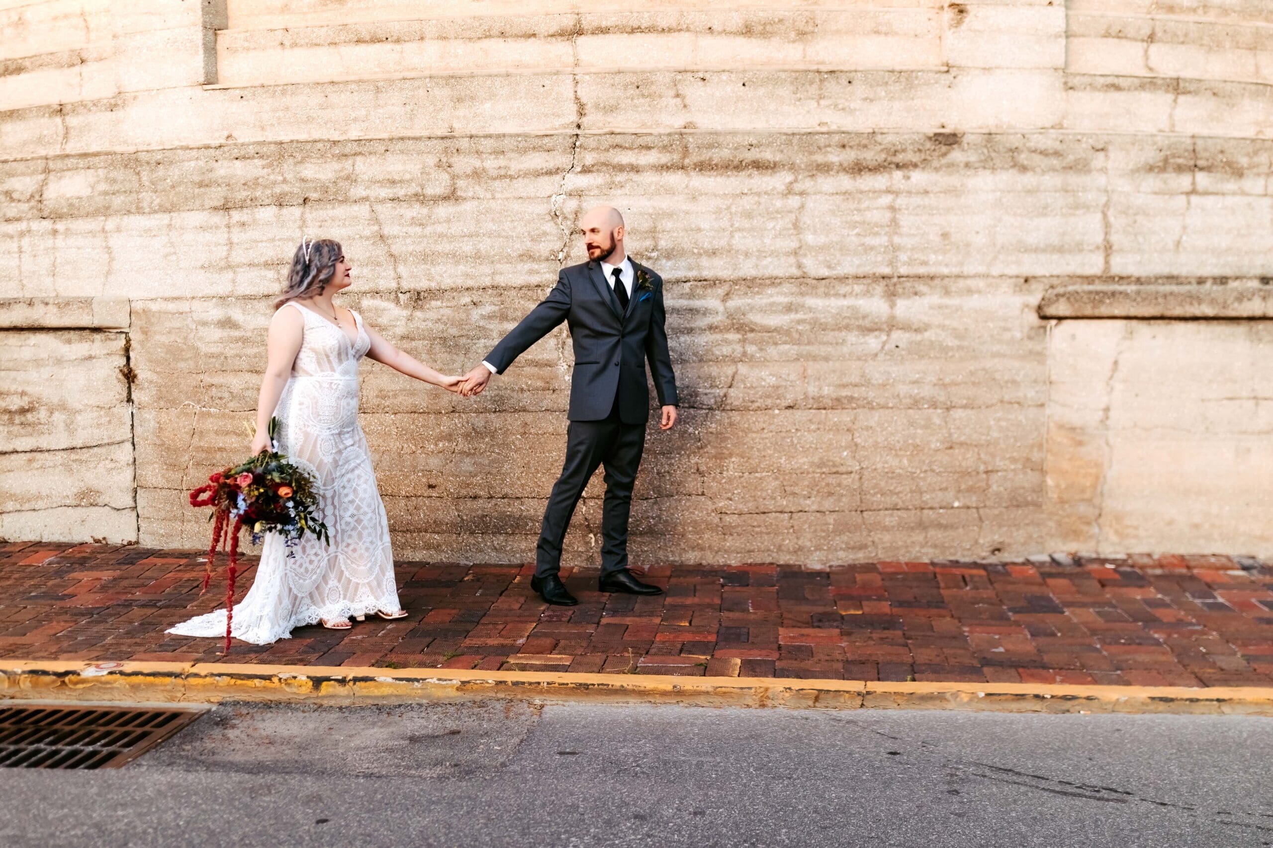 Newly Married couple walking around the Lightner Museum in Saint Augustine FL