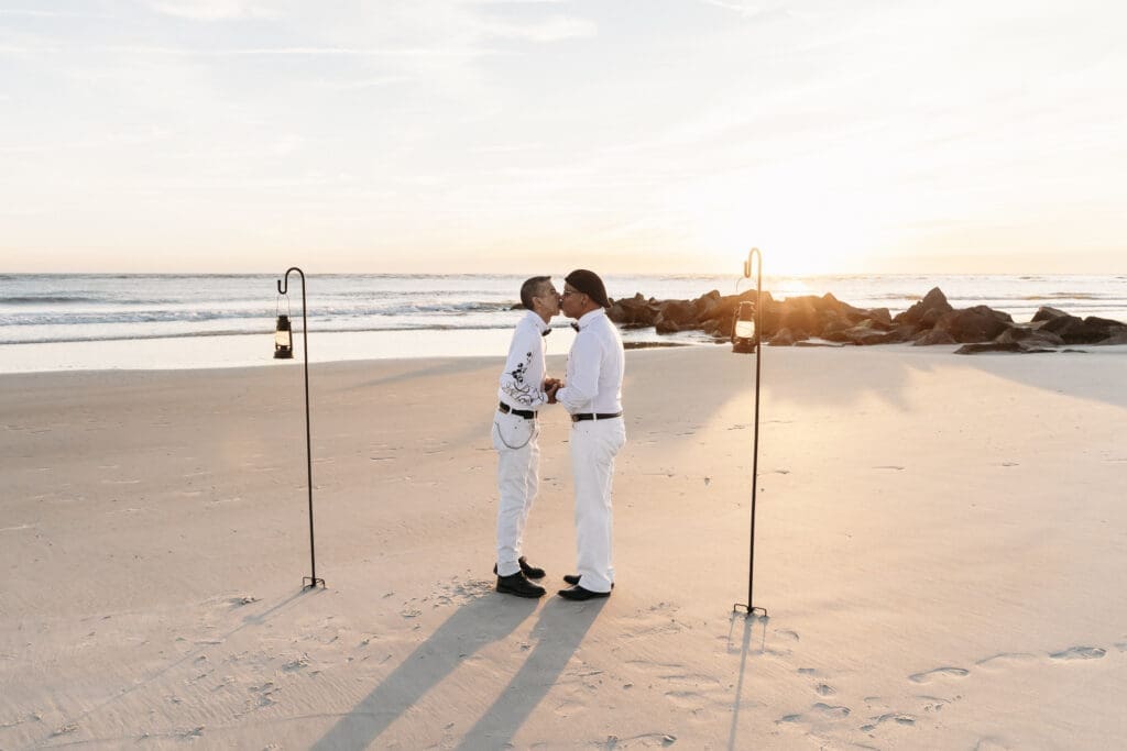 Gay couple kissing after saying their vows
